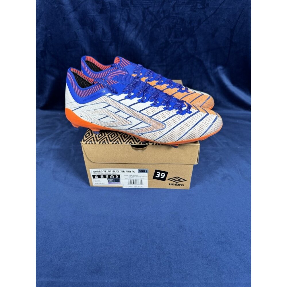 MSRP $275 Umbro Velocita Elixir Pro FG White/Deep Surf/Vermillion Orange 0881